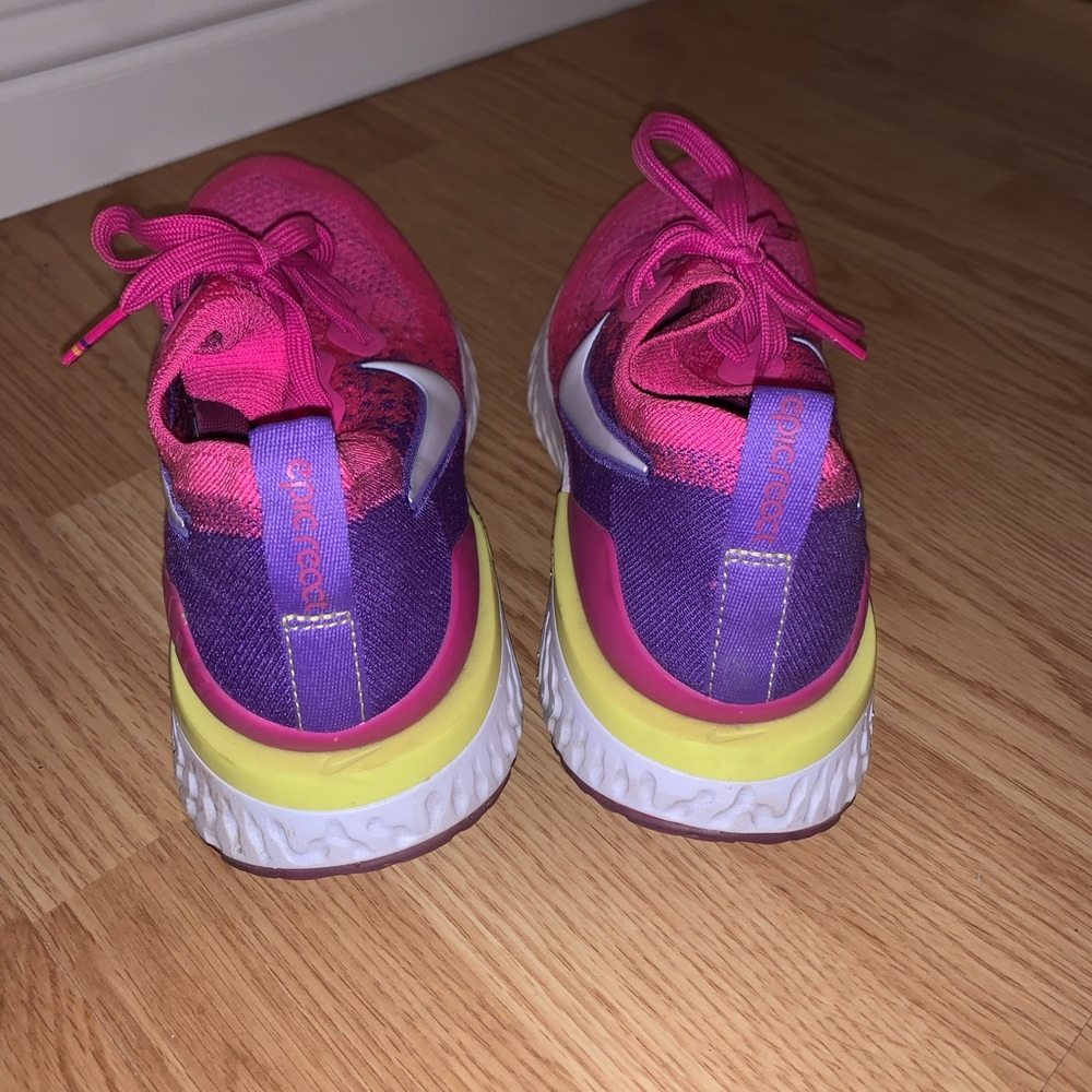 Nike fushia epic react running shoes